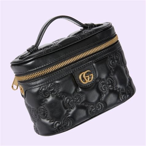 GG super mini top handle bag in black GG leather 